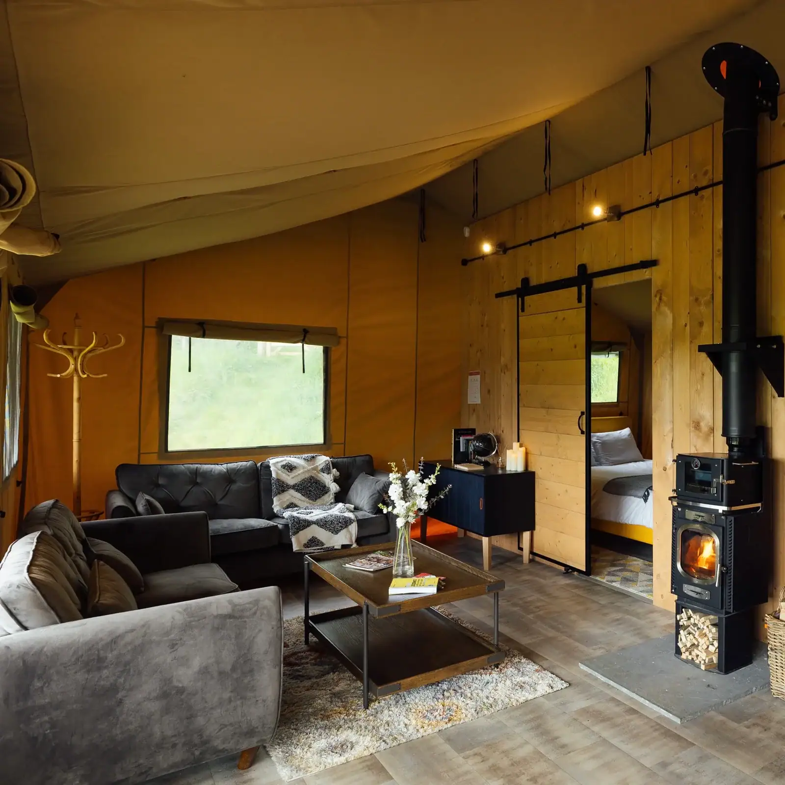 off-grid safari lodge with wood burner and solar power in Somerset countryside