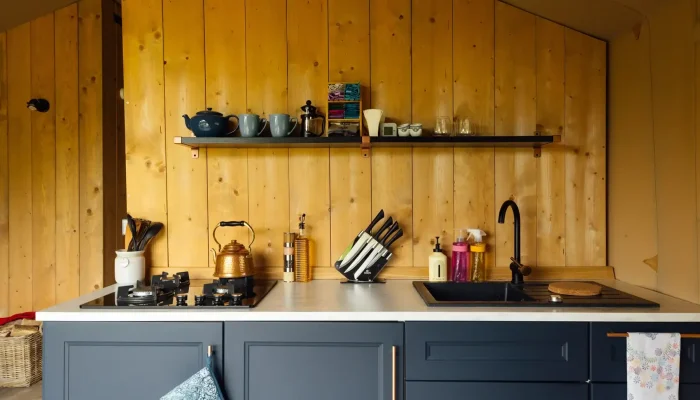 Fully equipped kitchen inside Horsecombe Lodge safari tent in Somerset