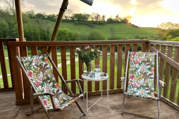 Horsecombe Lodge at dusk with soft lightning and countryside surroundings in Somerset