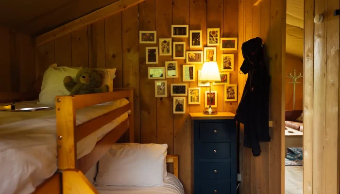 Second bedroom in Lime Kiln Lodge with double bed and single bunk above for families